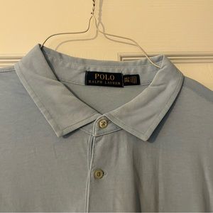 Blue short sleeve polo shirt. In good condition— worn a few times. No returns!